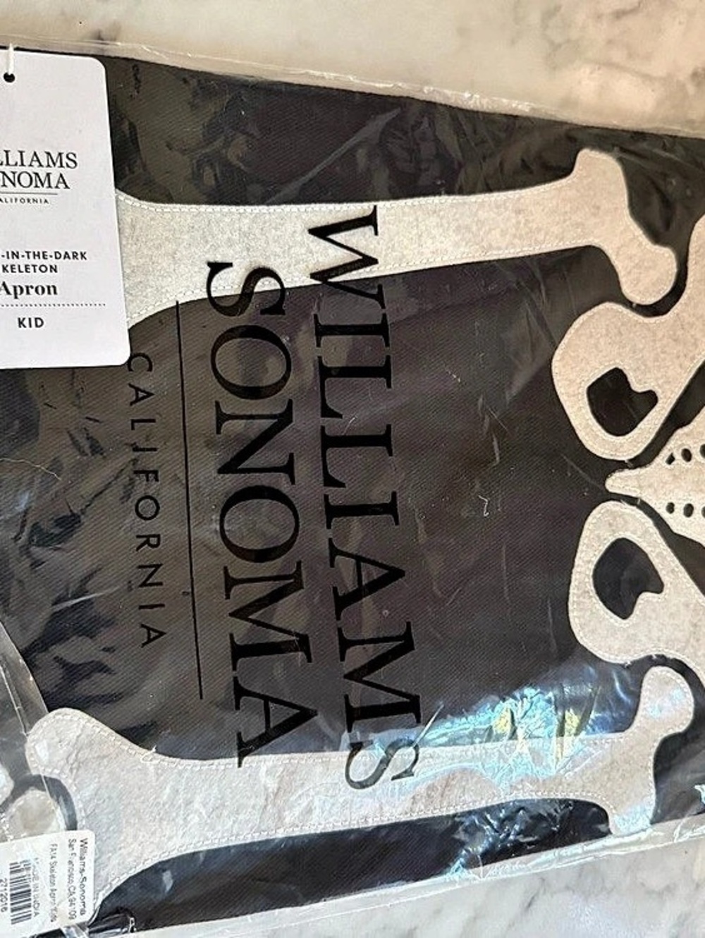 New Williams Sonoma Glow-in-the-Dark Skeleton Kids Apron Halloween Black White